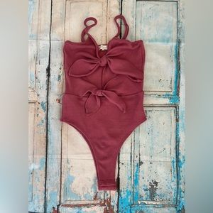 Mauve body suit